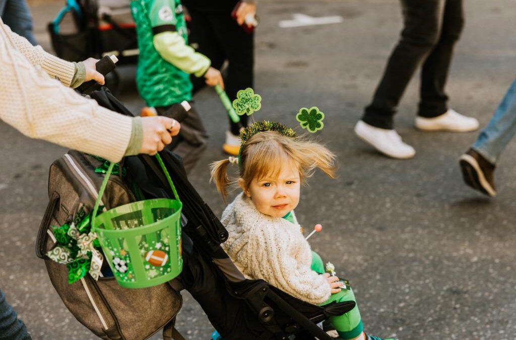Photos of the Raleigh St. Patrick's Day Parade. Kids, adults and lots of balloons, Grand Marshal Sandra Holland. Downtown Raleigh, NC. 
