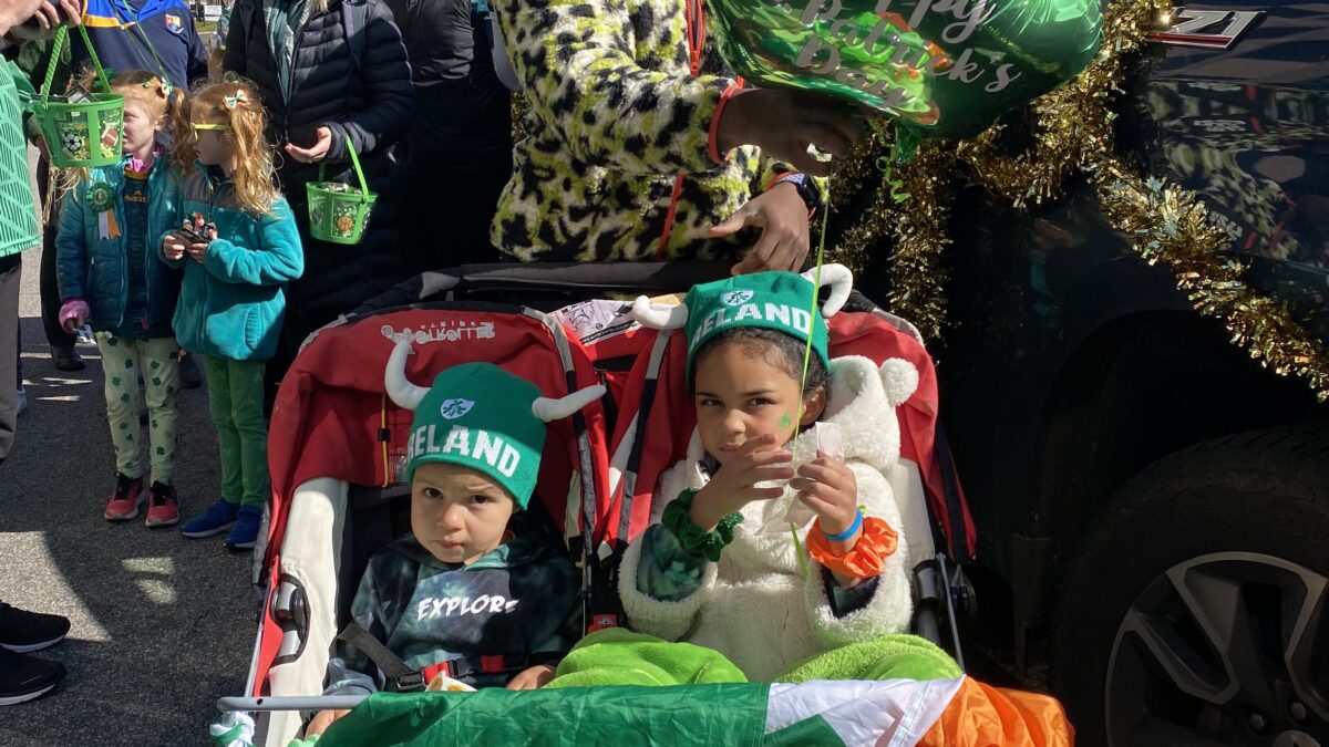 Photos of the Raleigh St. Patrick's Day Parade. Kids, adults and lots of balloons, Grand Marshal Sandra Holland. Downtown Raleigh, NC. 