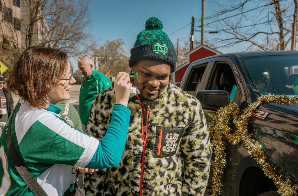 Photos of the Raleigh St. Patrick's Day Parade. Kids, adults and lots of balloons, Grand Marshal Sandra Holland. Downtown Raleigh, NC. 